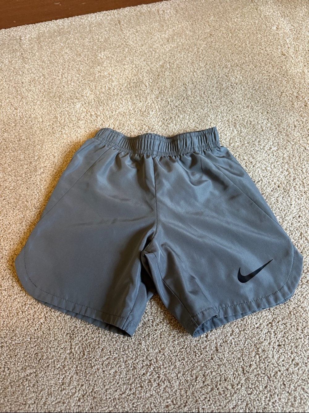 Nike Gray Kids Athletic Shorts with Black Swoosh